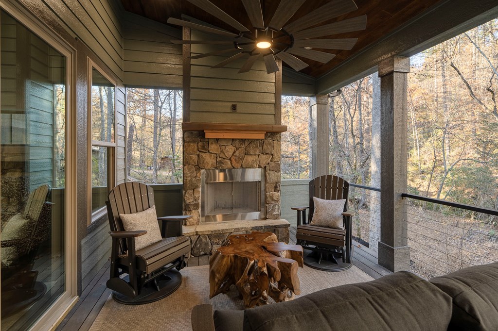 1214 John Abernathy Road Blairsville, GA 30512 - Photo 37 of 53 a living room with furniture and a large window