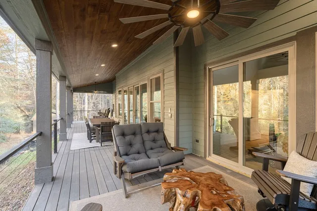 a view of balcony with furniture