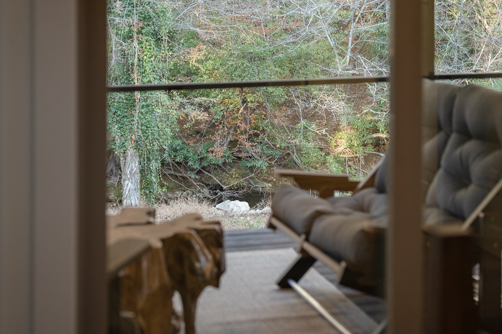 1214 John Abernathy Road Blairsville, GA 30512 - Photo 39 of 53 a living room with furniture and a window