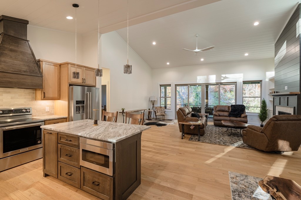 1214 John Abernathy Road Blairsville, GA 30512 - Photo 4 of 53 a large kitchen with stainless steel appliances lots of counter top space