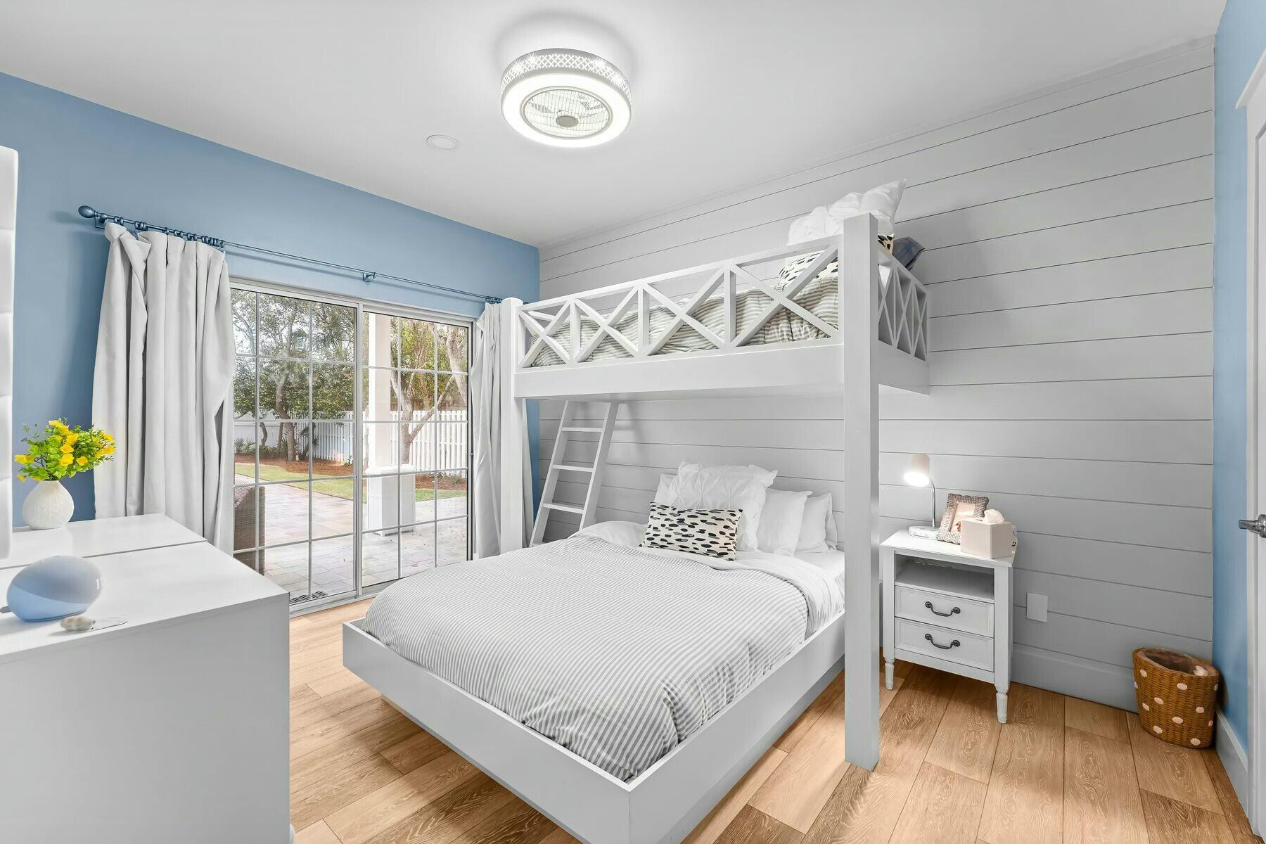 24 Seabreeze Circle Inlet Beach, FL 32461 - Photo 13 of 27 a bedroom with a large bed and a window