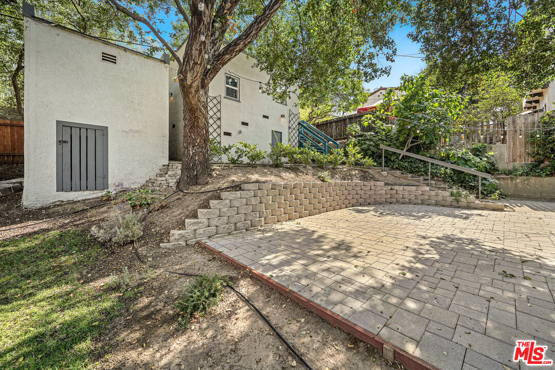 54 West Glenarm Street Pasadena, CA 91105 - Photo 14 of 18 a view of a yard with plants and large trees