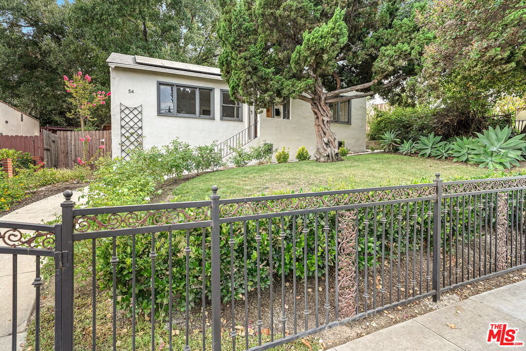 54 West Glenarm Street Pasadena, CA 91105 - Photo 17 of 18 a front view of a house with garden