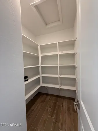 a view of a room with rack on the wall