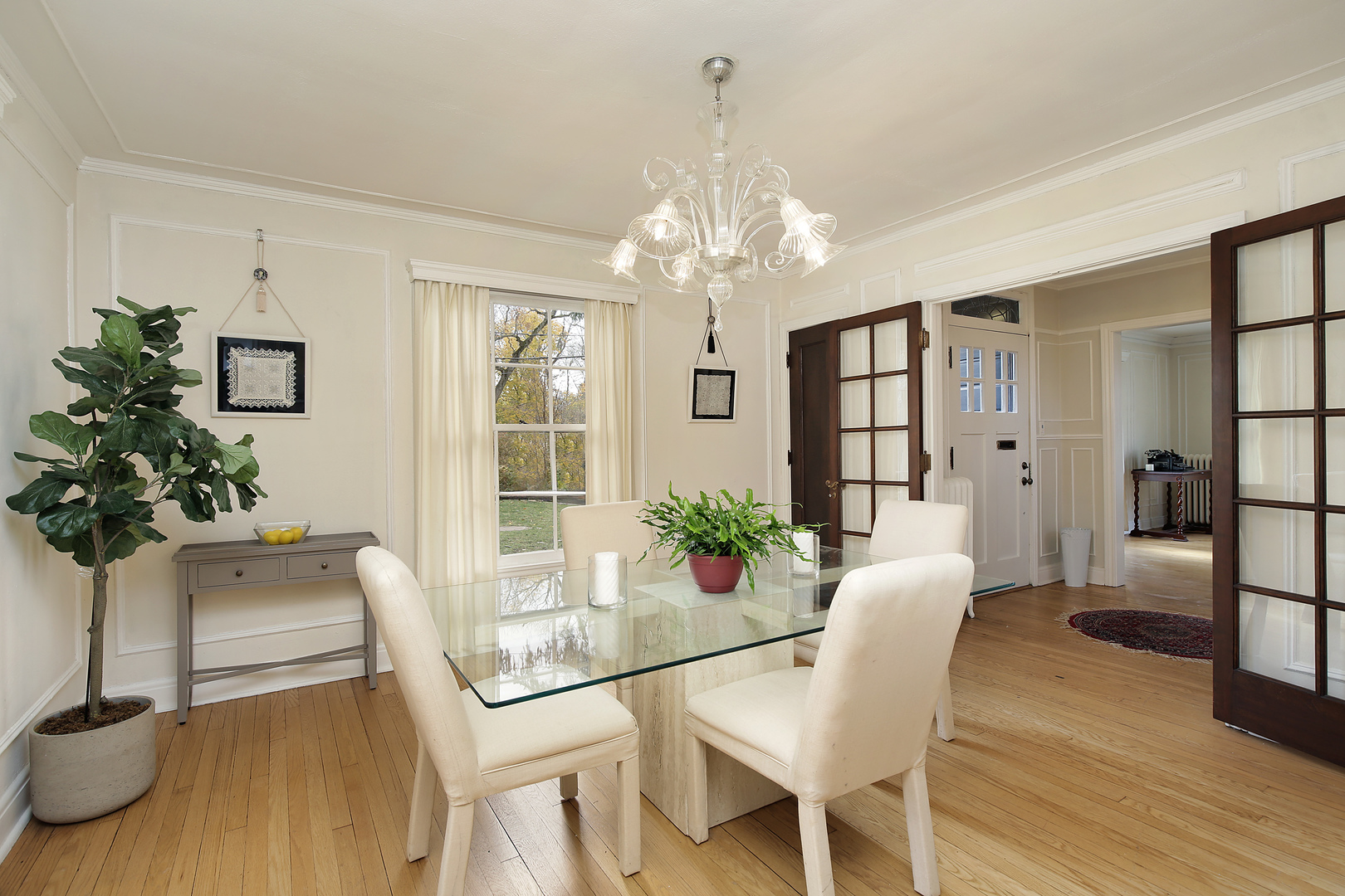 229 Sylvan Road Glencoe, IL 60022 - Photo 11 of 35 a view of a dining room with furniture and wooden floor