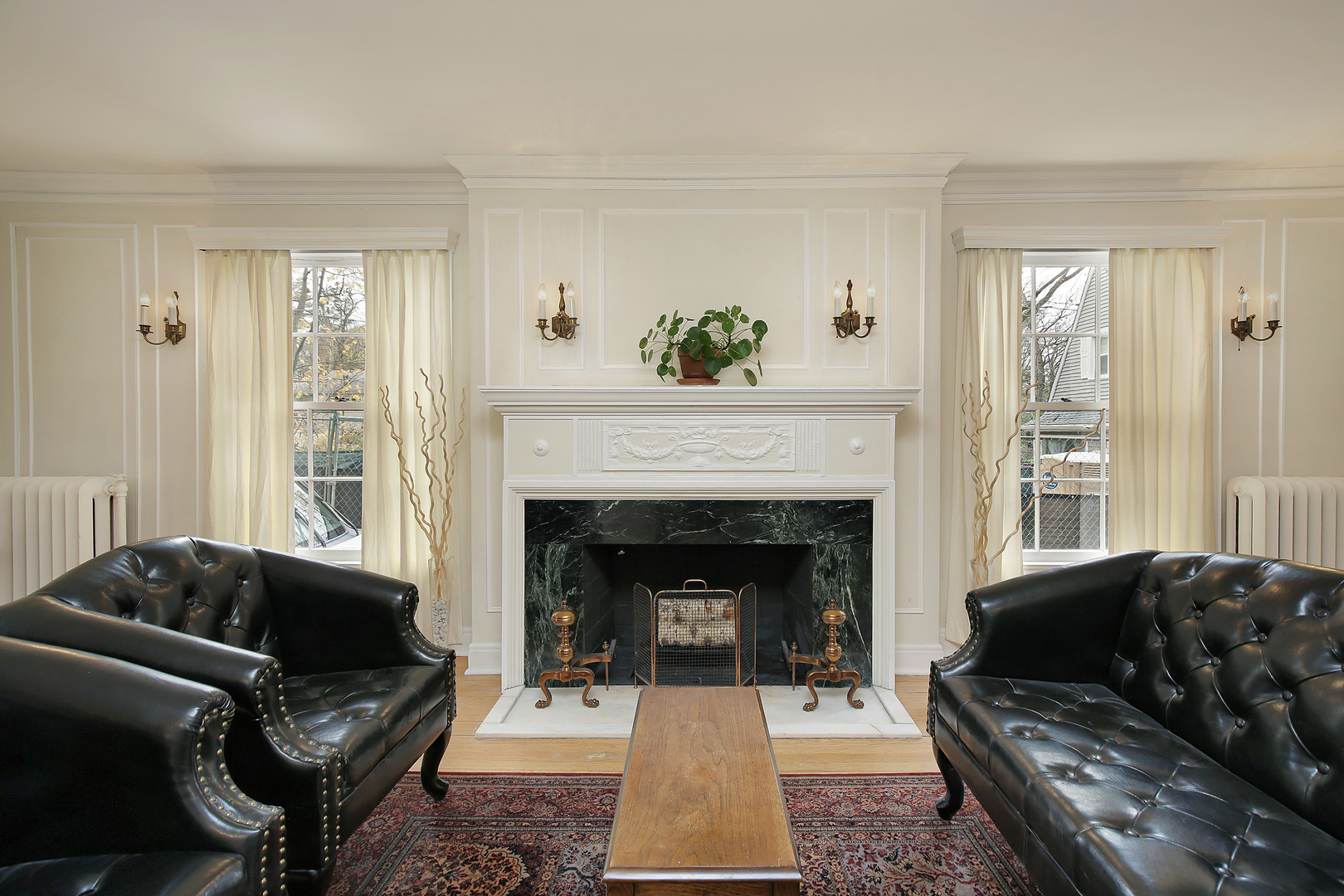 229 Sylvan Road Glencoe, IL 60022 - Photo 6 of 35 a living room with furniture and a fireplace