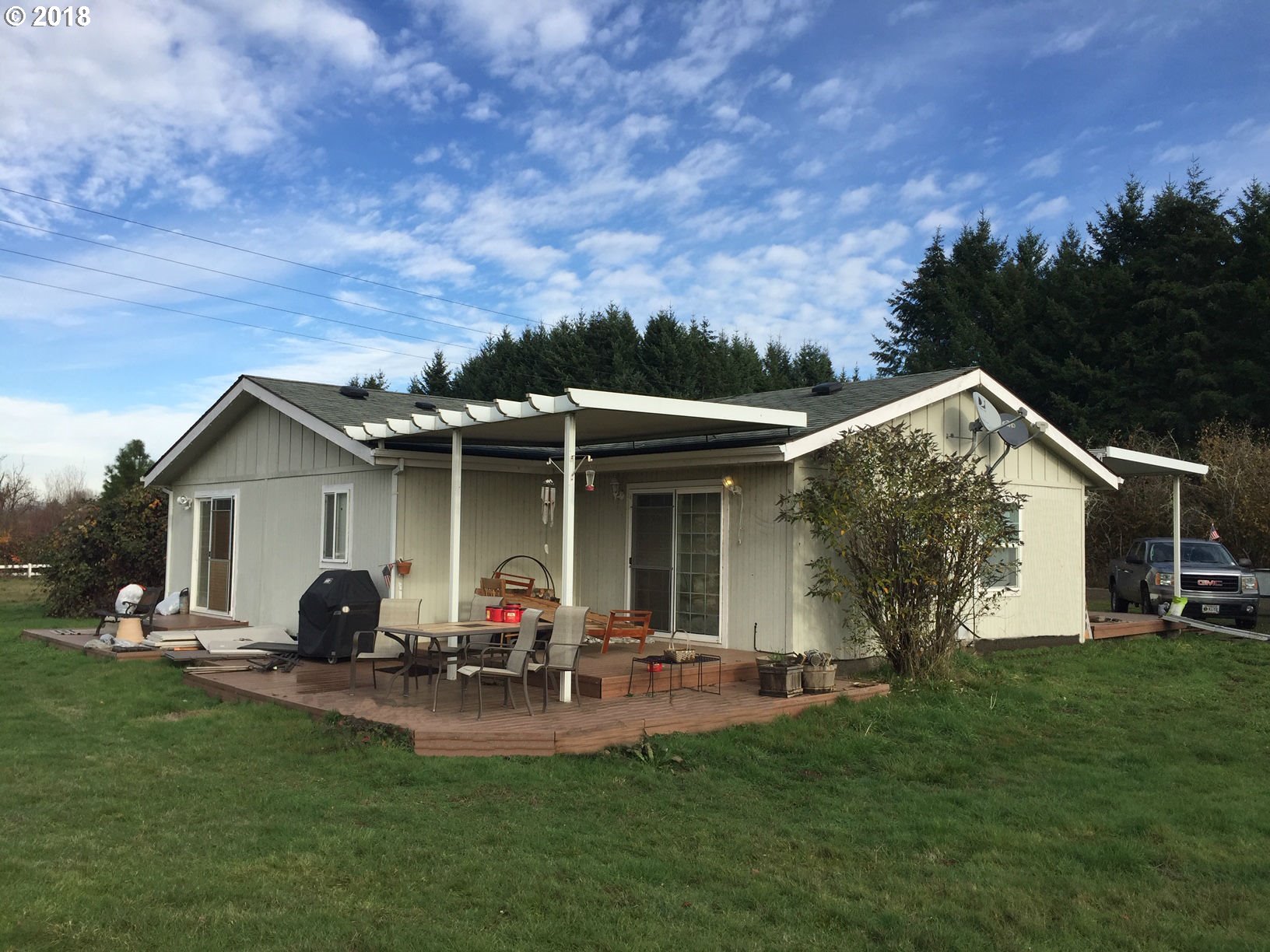 43566 Southwest Hiatt Road Forest Grove, OR 97116 - Photo 1 of 7 a view of a house with backyard and porch