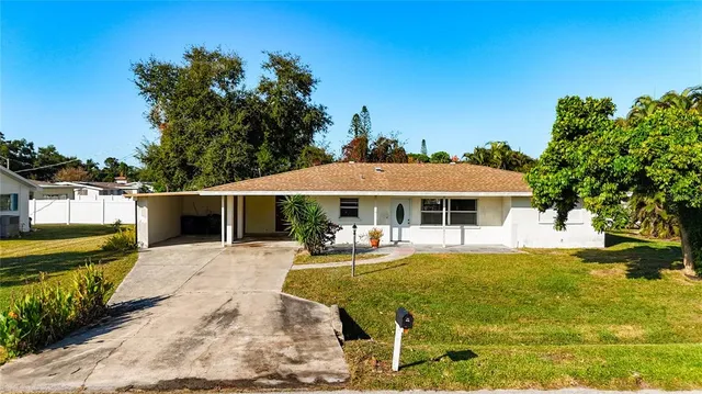 a house with garden in front of it