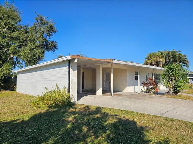 a house view with a garden space