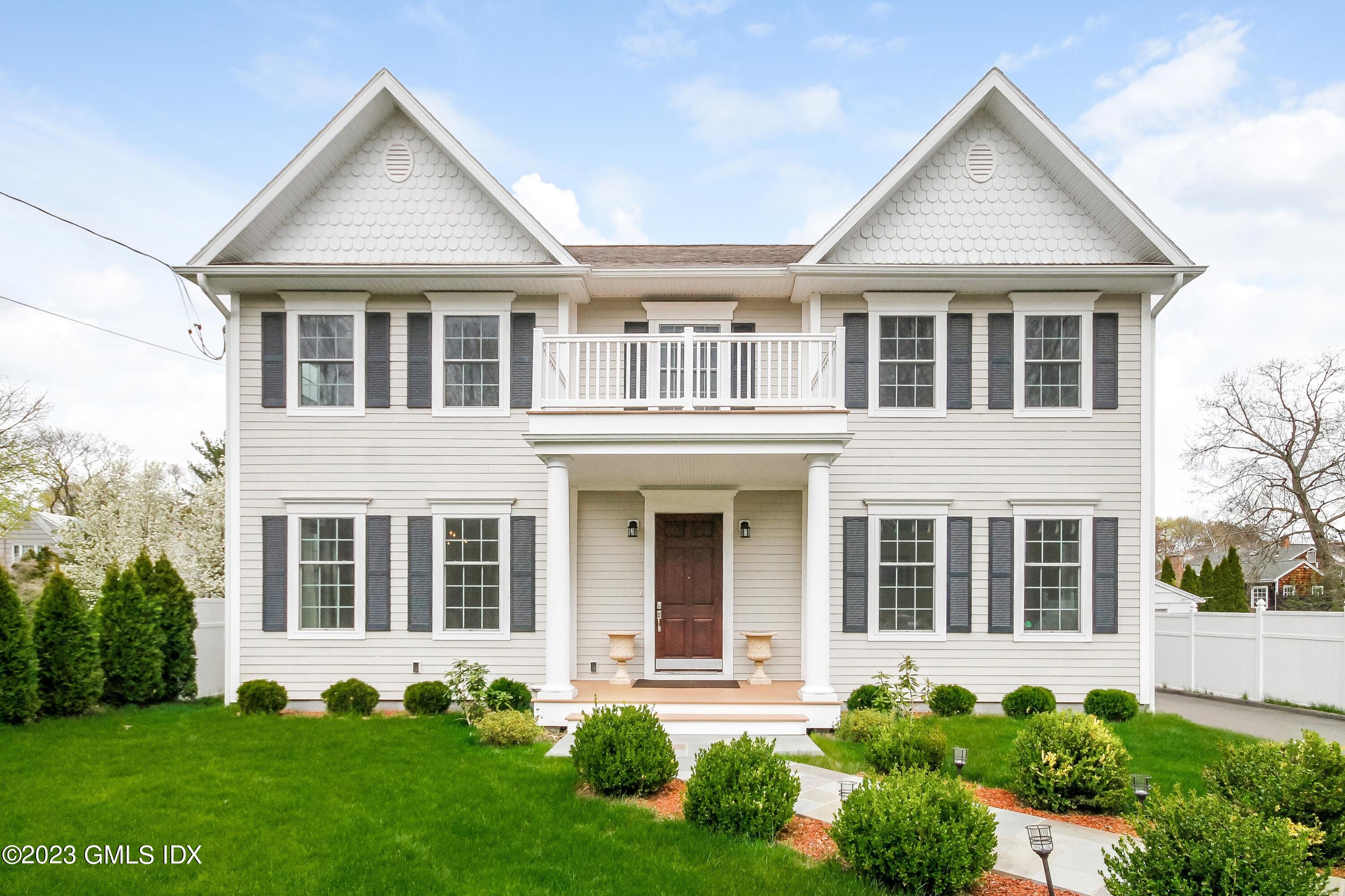63 Sound Beach Ave Extension Riverside, CT 06878 - Photo 1 of 1 front view of a house with a yard