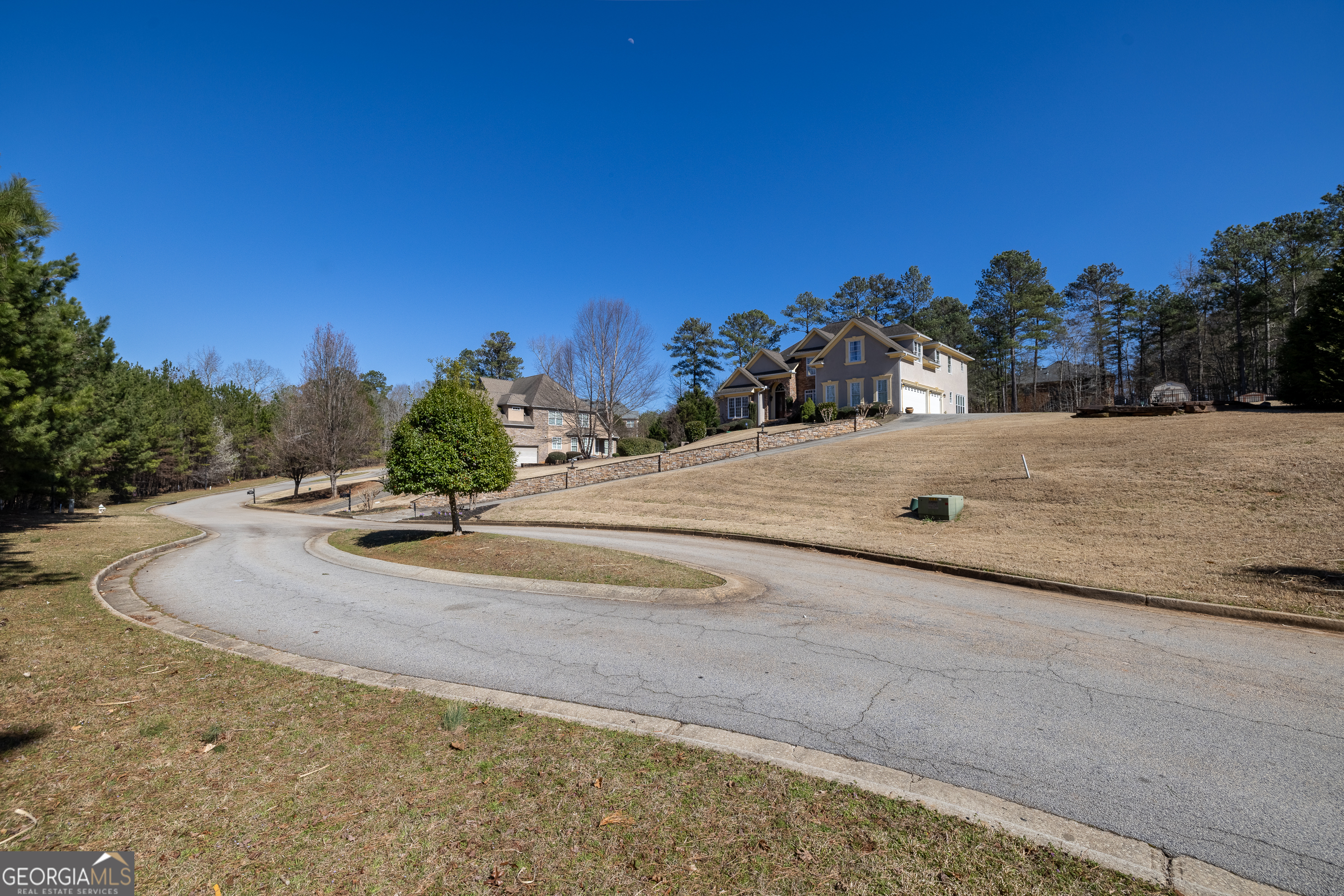 0 Fontainble Swau Road Covington, GA 30016 - Photo 55 of 60 a view of a dry yard with a building in the background