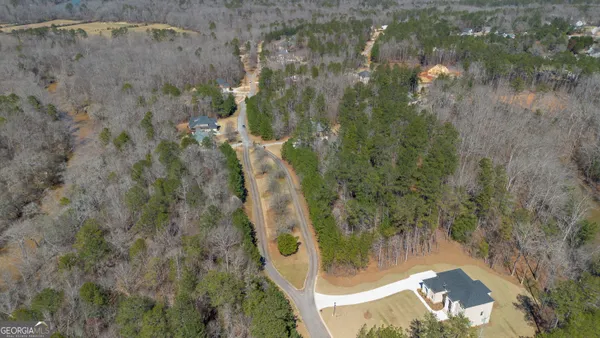 a view of a lake with a yard