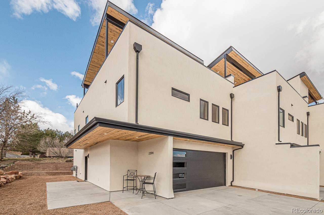 2398 Ridge Cir Drive, Unit A Grand Junction, CO 81507 - Photo 25 of 30 a view of a house with a street