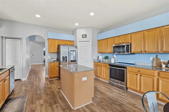 a very nice looking dining room with a table and chairs