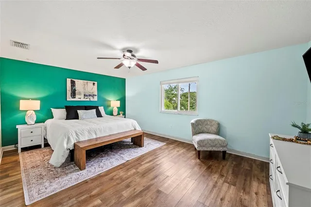 a bathroom with a tub and shower