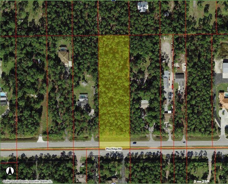 4469 Pine Ridge Road Naples, FL 34119 - Photo 3 of 5 an aerial view of a yard