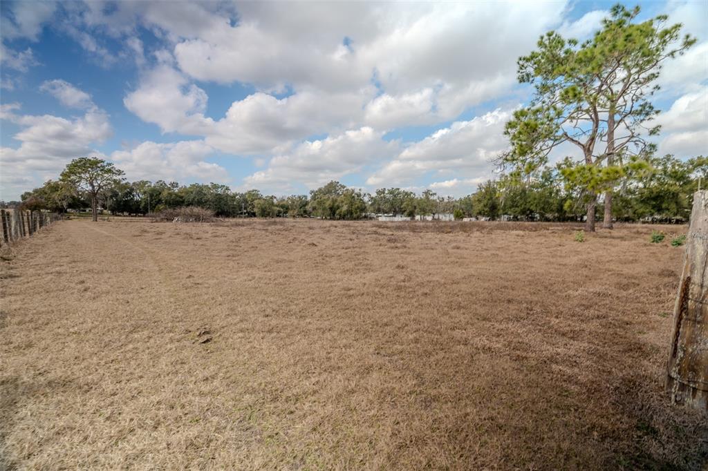 36630 Sunshine Road Zephyrhills, FL 33541 - Photo 7 of 20 a view of lake