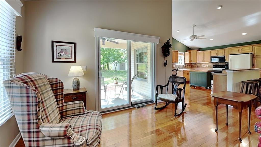 113 Clover Road Baden, PA 15005 - Photo 11 of 50 a living room with furniture and a table