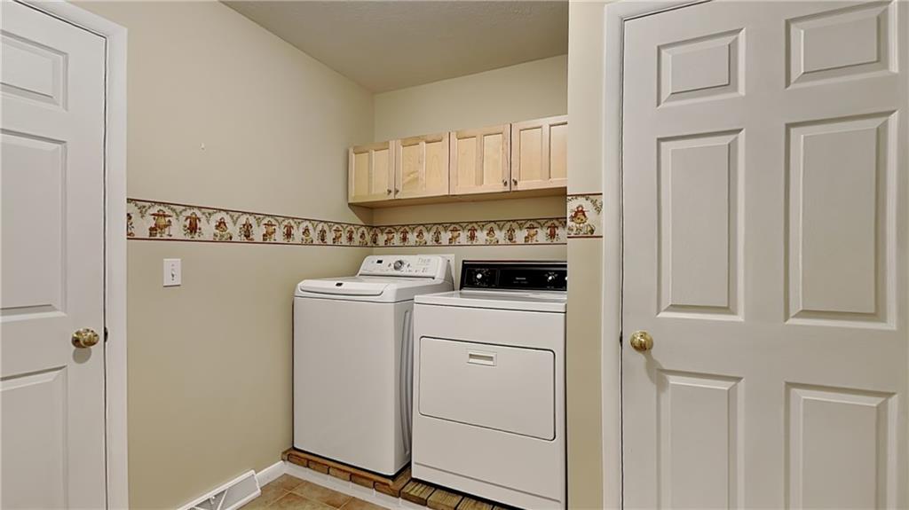113 Clover Road Baden, PA 15005 - Photo 33 of 50 a utility room with dryer and washer