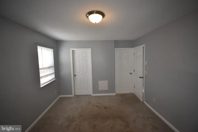 wooden floor and windows in an empty room