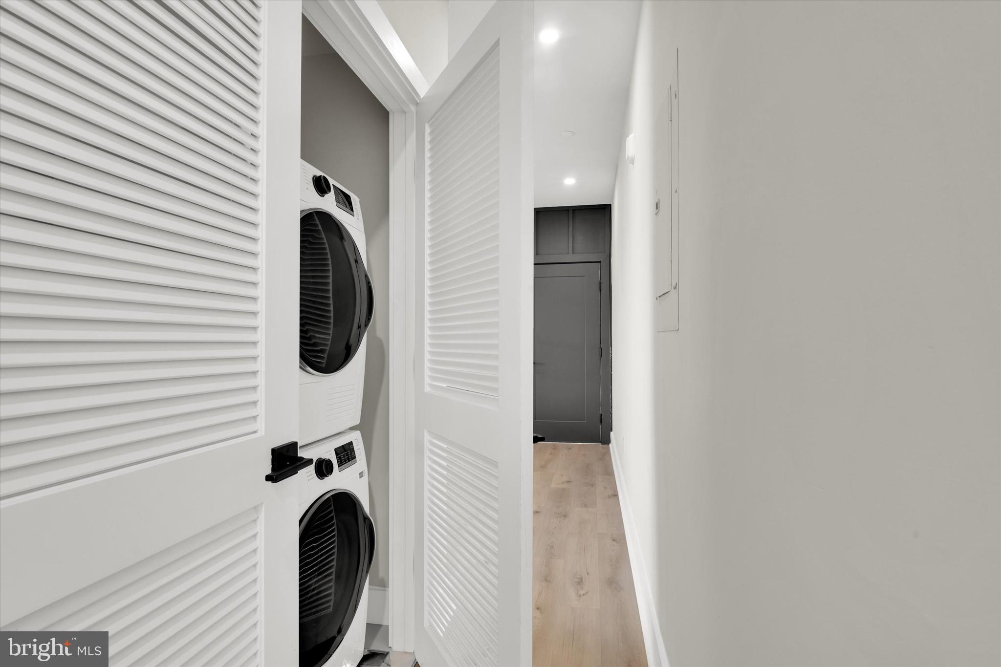 1915 Benning Road Northeast, Unit 8 Washington, DC 20002 - Photo 15 of 17 a close view of a utility room with dryer and washer