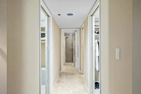 a bed room with a bed and a television