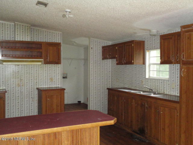 9440 Ridge Boulevard Jacksonville, FL 32208 - Photo 15 of 25 15. KITCHEN VIEW 3