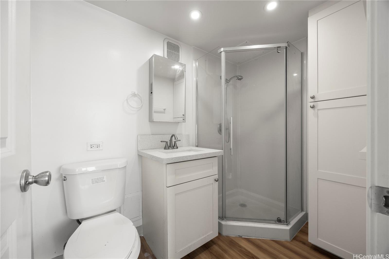 412 Launiu Street Honolulu, HI 96815 - Photo 11 of 20 a bathroom with a toilet sink and shower