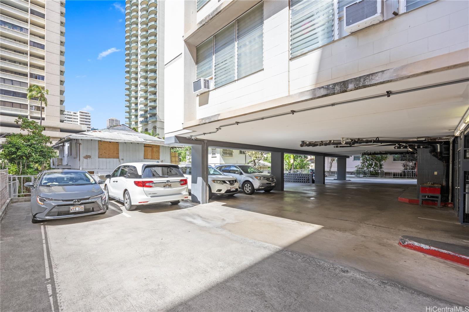 412 Launiu Street Honolulu, HI 96815 - Photo 18 of 20 a view of a cars park in front of building