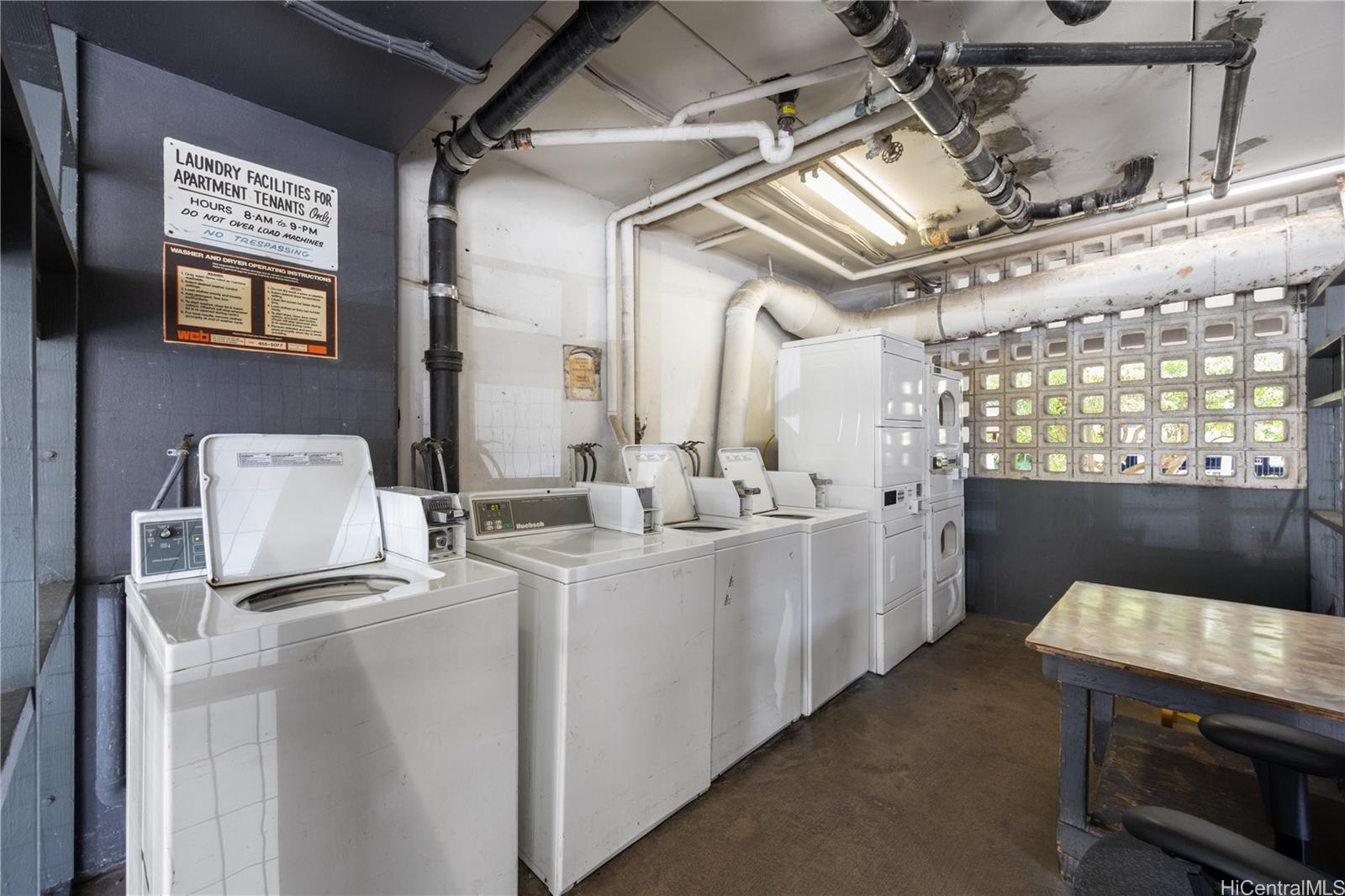412 Launiu Street Honolulu, HI 96815 - Photo 20 of 20 a utility room with dryer and washer
