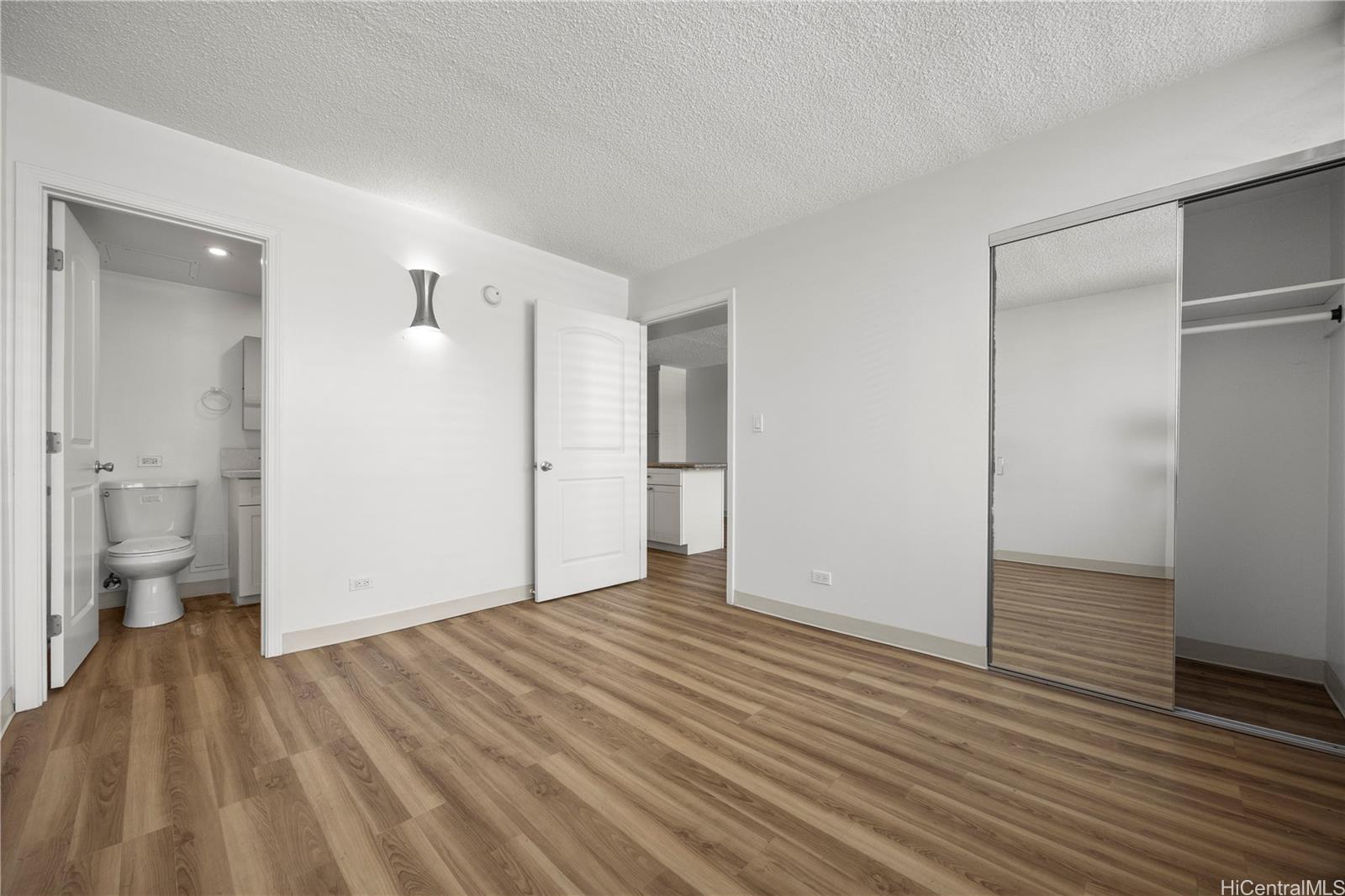 412 Launiu Street Honolulu, HI 96815 - Photo 10 of 20 a view of an empty room and wooden floor