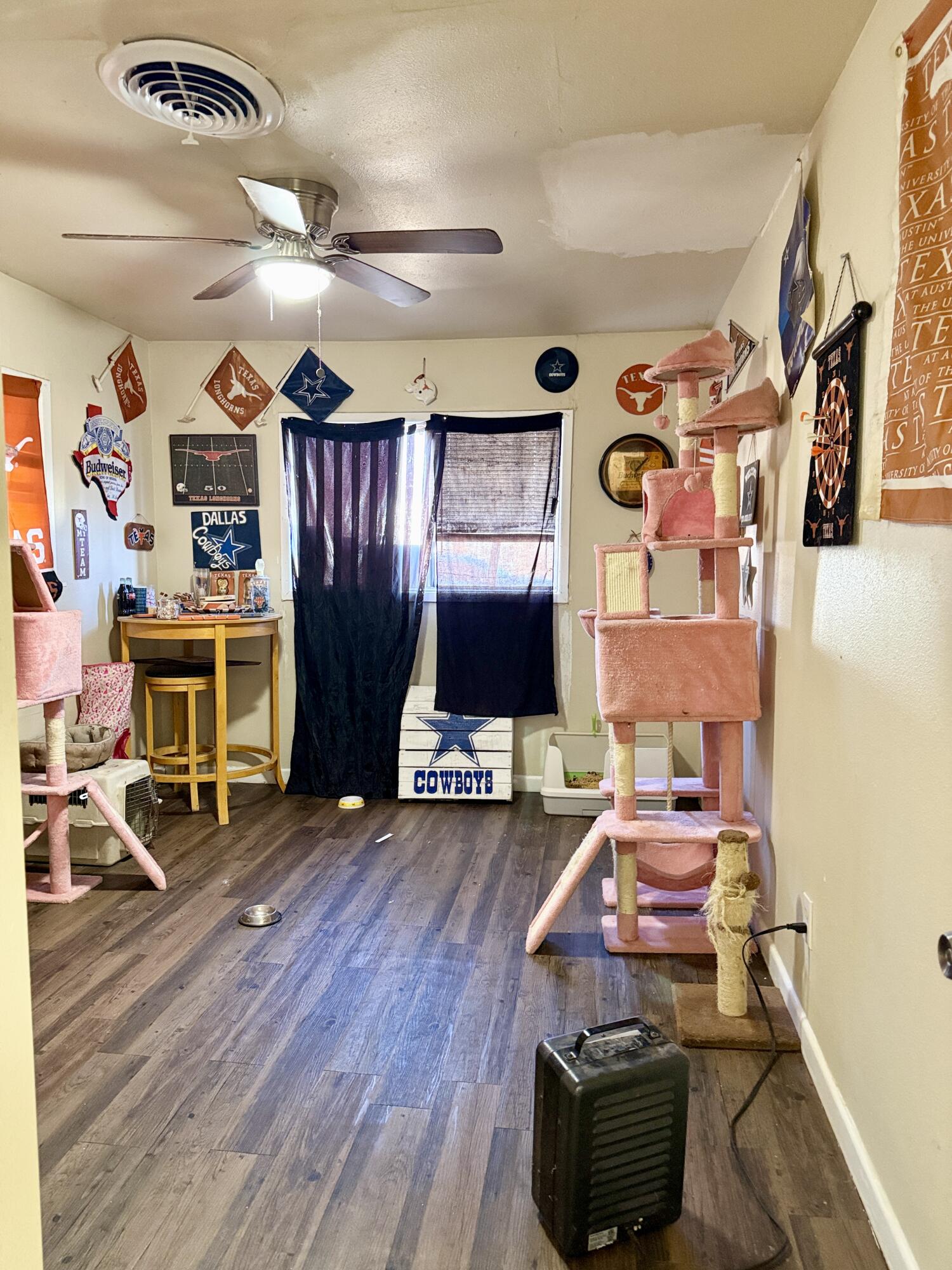 3708 Elgin Avenue Lubbock, TX 79413 - Photo 14 of 23 a living room with furniture and a wooden floor