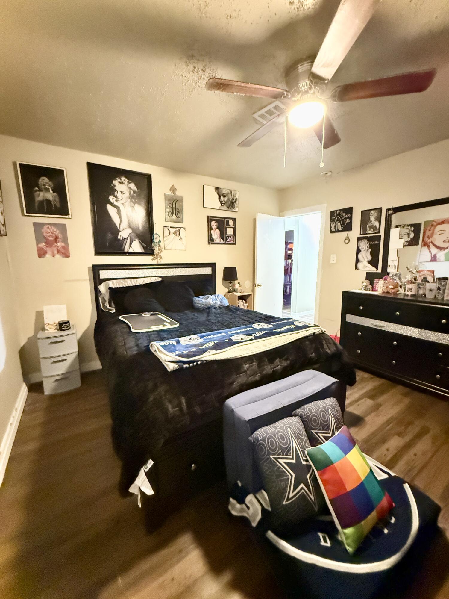 3708 Elgin Avenue Lubbock, TX 79413 - Photo 23 of 23 a living room with furniture and a table