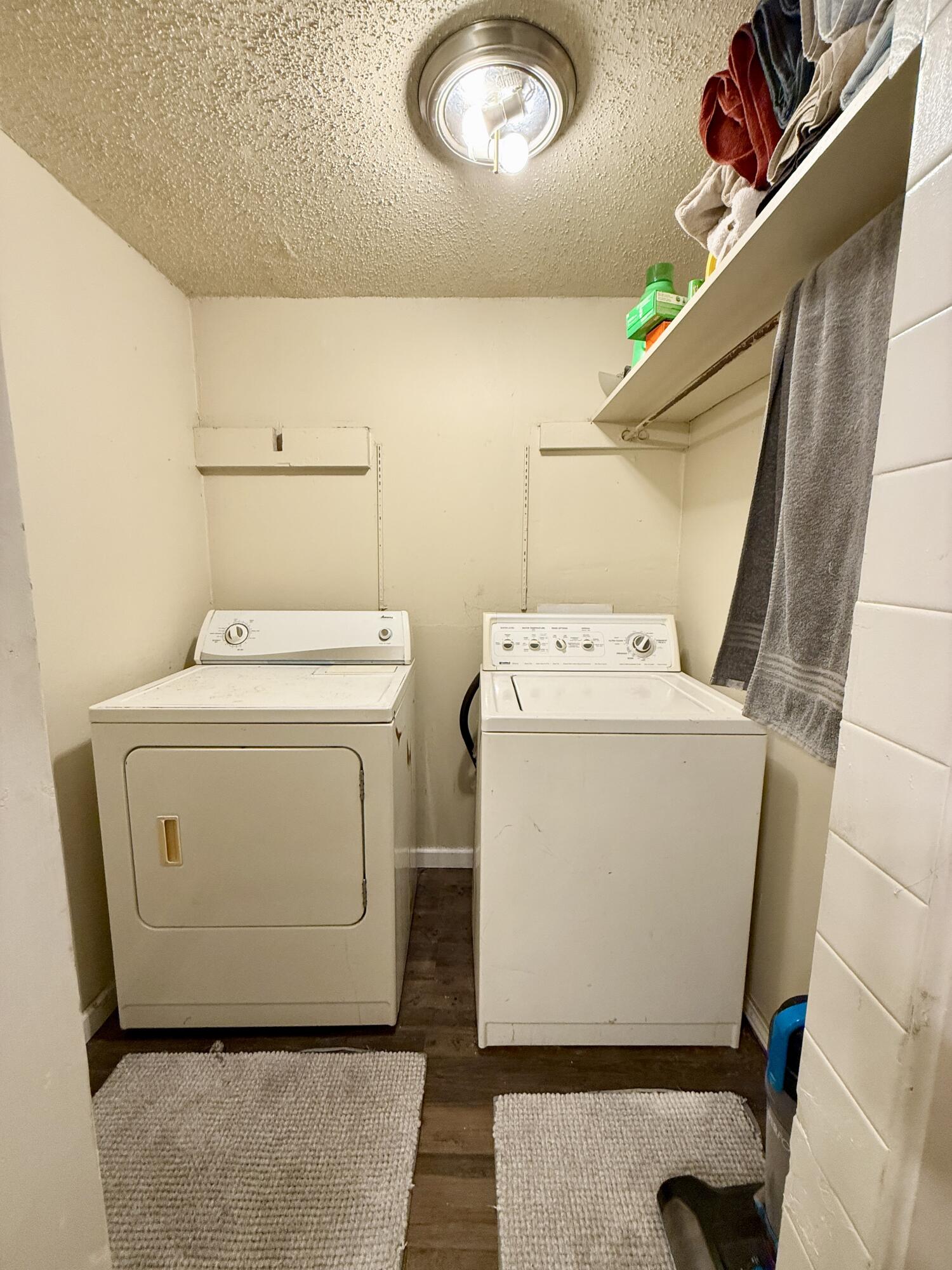3708 Elgin Avenue Lubbock, TX 79413 - Photo 7 of 23 a utility room with dryer and washer