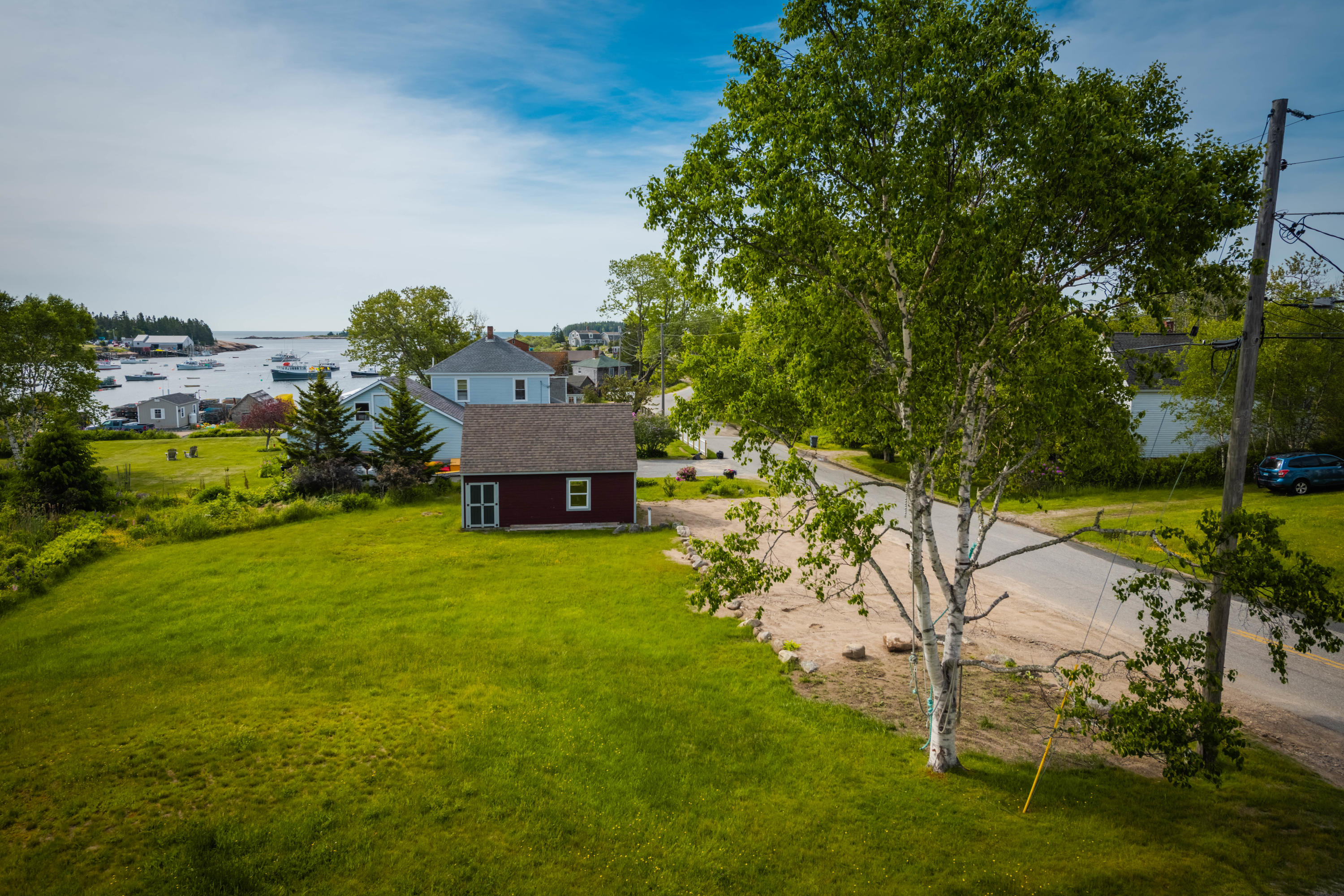 646 Corea Road Corea, ME 04624 - Photo 2 of 19 Back yard and rear side of house.