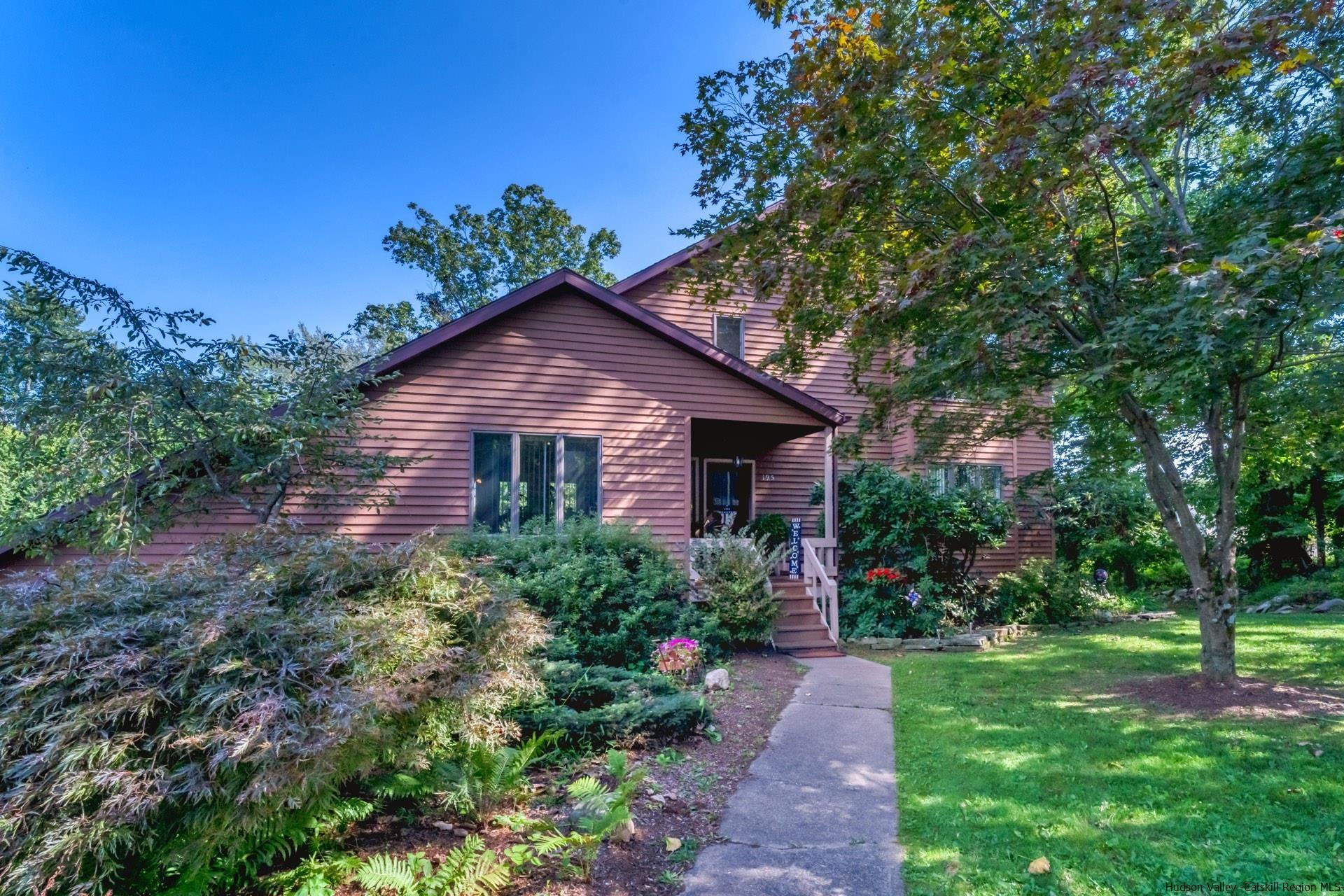 a view of a house with garden