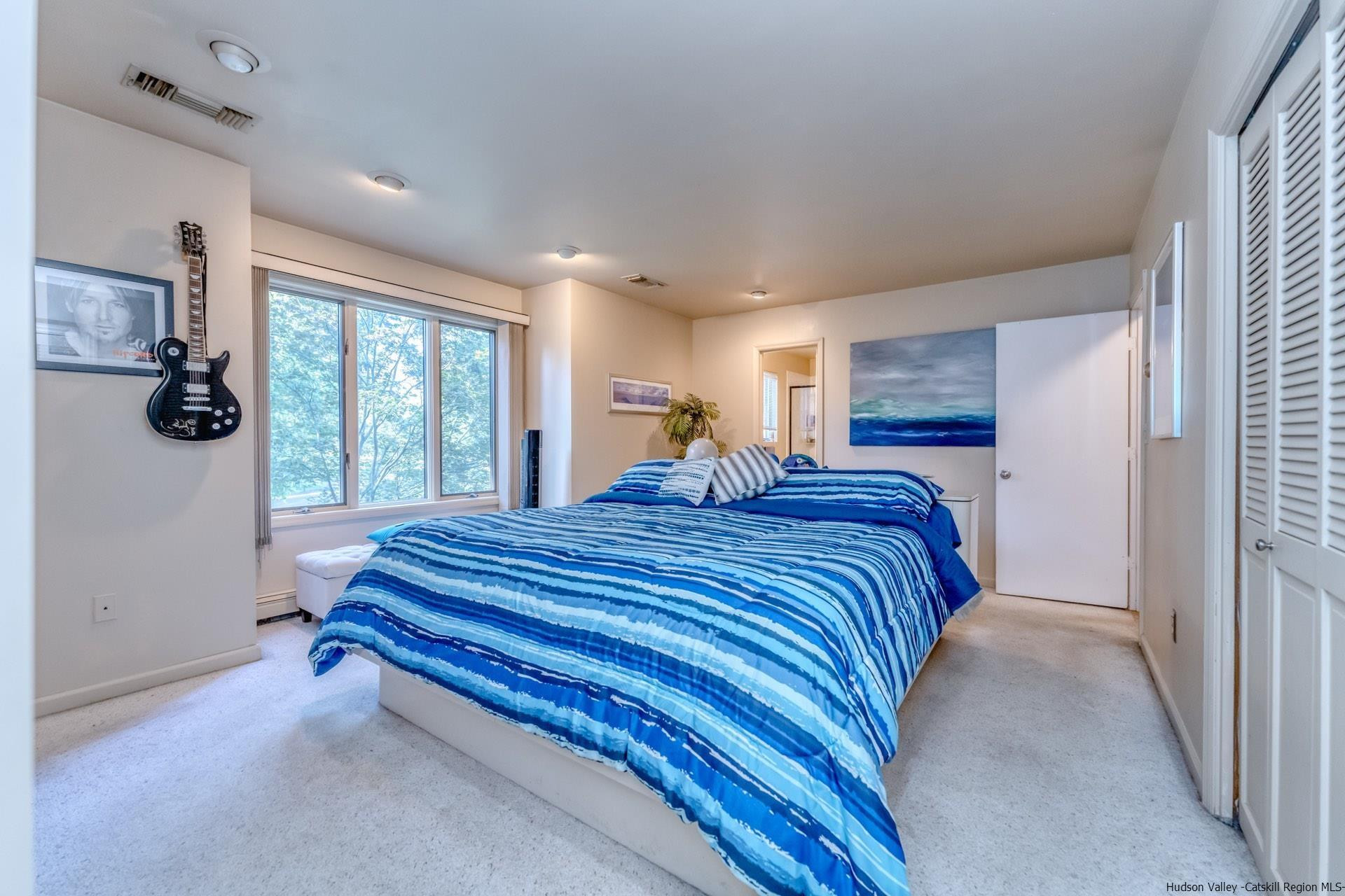 195 Arnold Drive Kingston, NY 12401 - Photo 16 of 35 a bed room with a bed and a large window