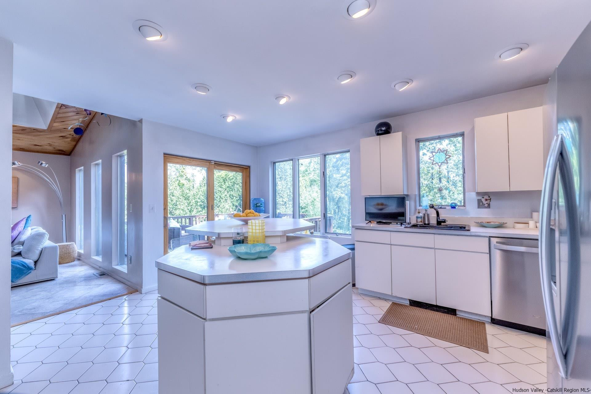 195 Arnold Drive Kingston, NY 12401 - Photo 9 of 35 a kitchen with sink cabinets and window