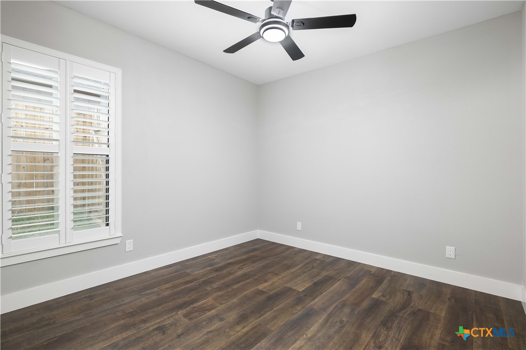 537 Compass Rose Spring Branch, TX 78070 - Photo 20 of 29 a view of a room with wooden floor and windows
