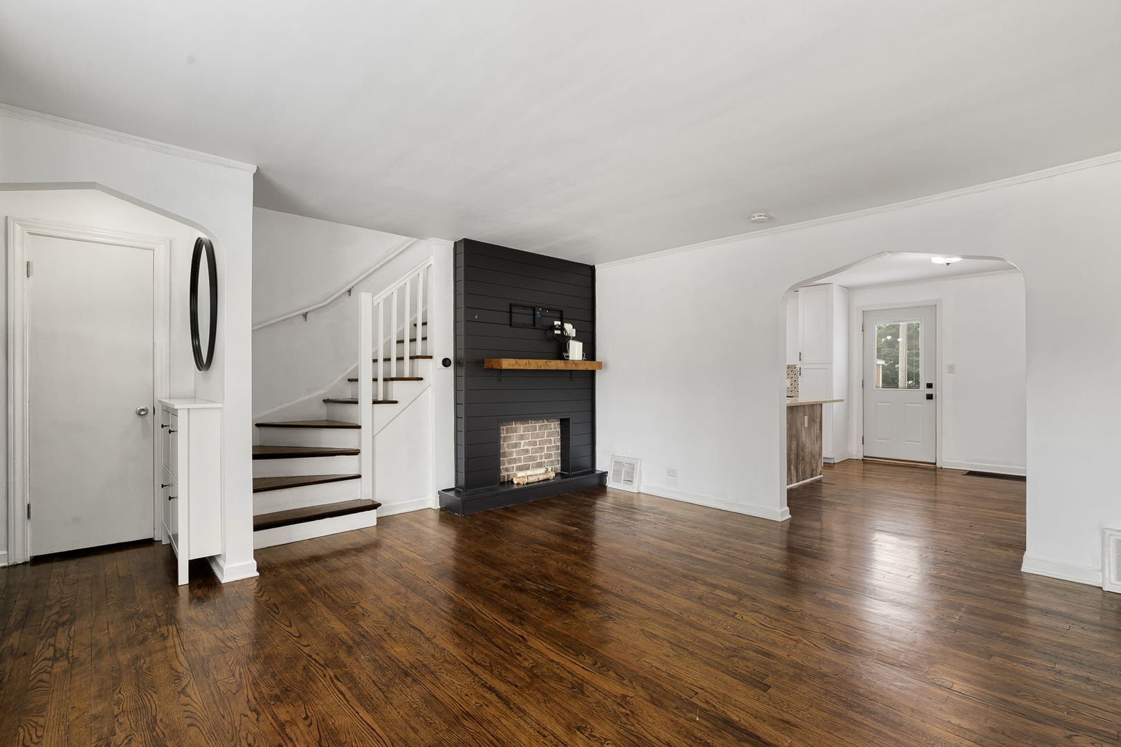 4237 Park Avenue Brookfield, IL 60513 - Photo 2 of 20 an empty room with wooden floor and windows