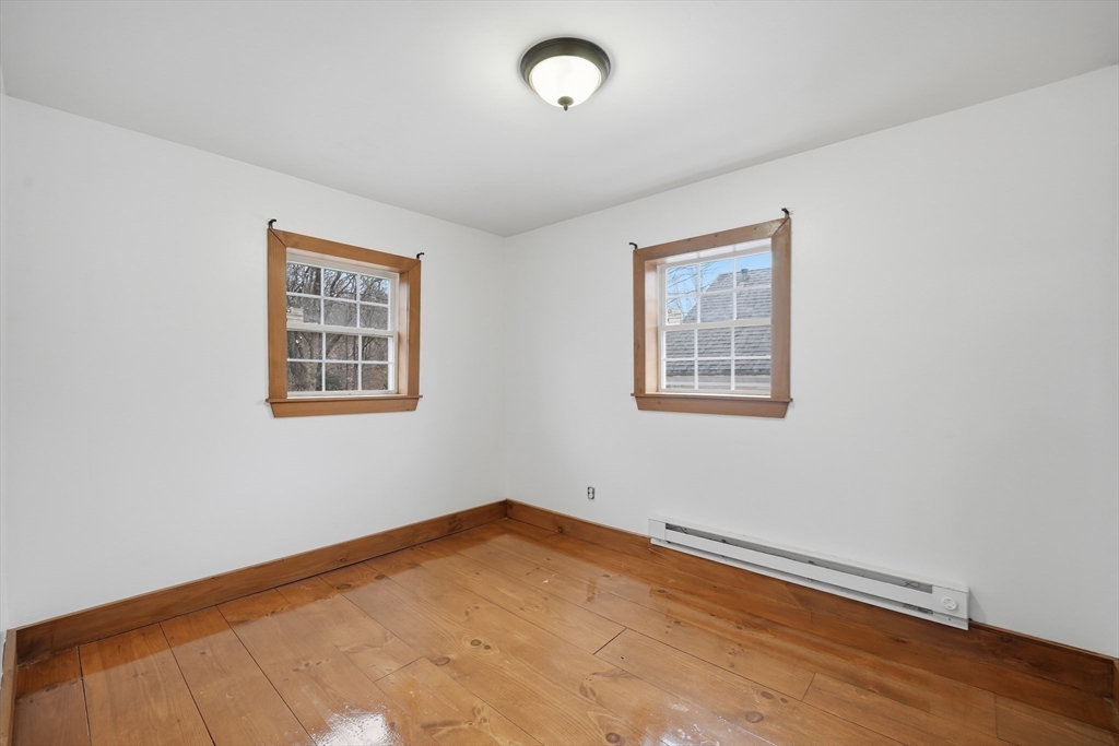 29 Liberty Street Warren, MA 01083 - Photo 35 of 39 a view of a room with wooden floor and window
