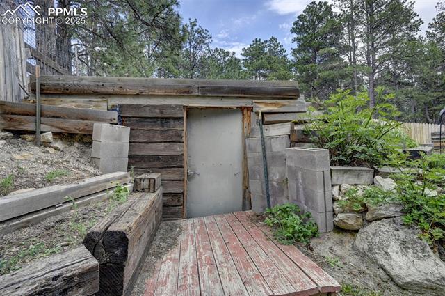18085 Table Rock Road Colorado Springs, CO 80908 - Photo 30 of 46 Doorway into Root Cellar