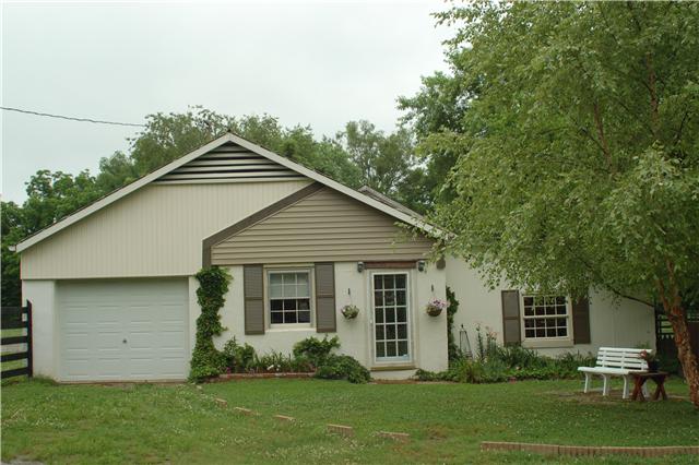 2121 Neelys Bend Road Madison, TN 37115 - Photo 11 of 20 DETACHED GARAGE AND WORKSHOP. NICE OFFICE AREA THAT IS HEATED AND COOLED. NEW GRAVEL FOR ENTIRE DRIVE WILL BE COMPLETE IN A FEW WEEKS.