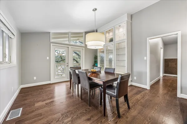 a kitchen with stainless steel appliances granite countertop a sink and cabinets