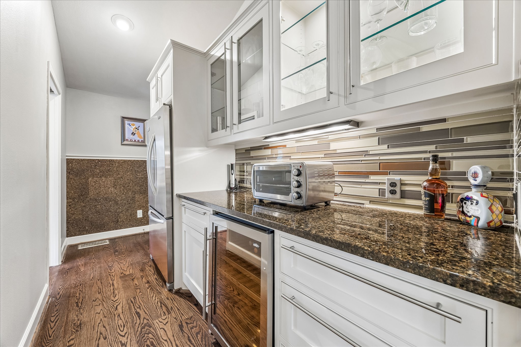 2613 Spring Lane Austin, TX 78703 - Photo 16 of 32 a kitchen with stainless steel appliances granite countertop a sink and cabinets