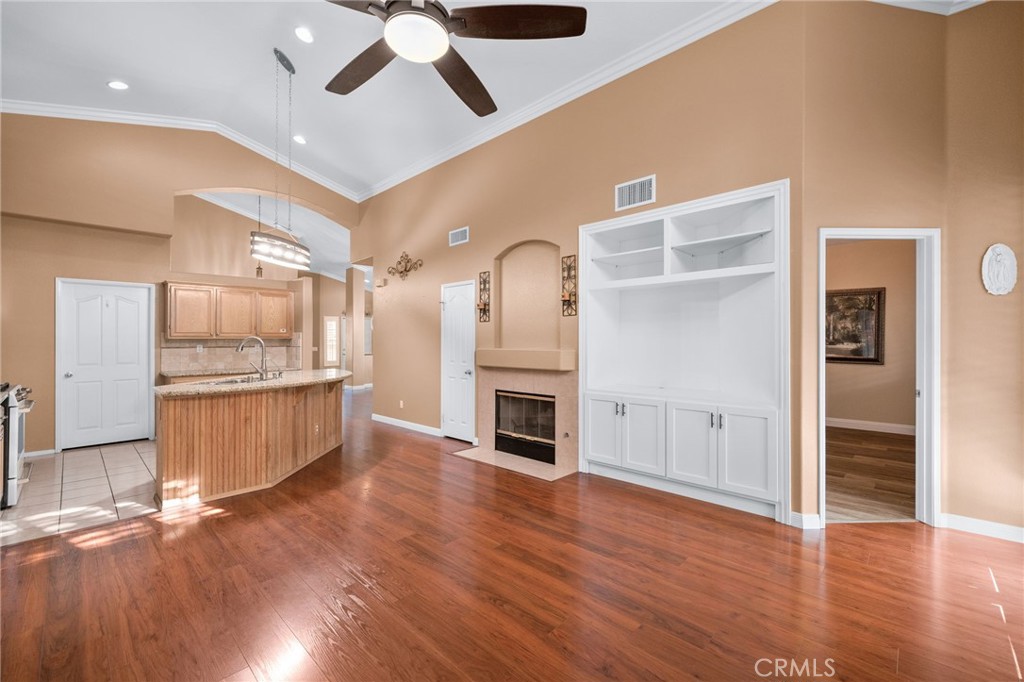 9403 Old Post Drive Rancho Cucamonga, CA 91730 - Photo 15 of 38 a view of a kitchen cabinets and wooden floor
