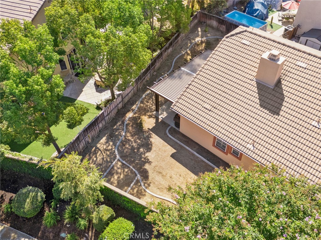 9403 Old Post Drive Rancho Cucamonga, CA 91730 - Photo 36 of 38 a view of a yard with plants