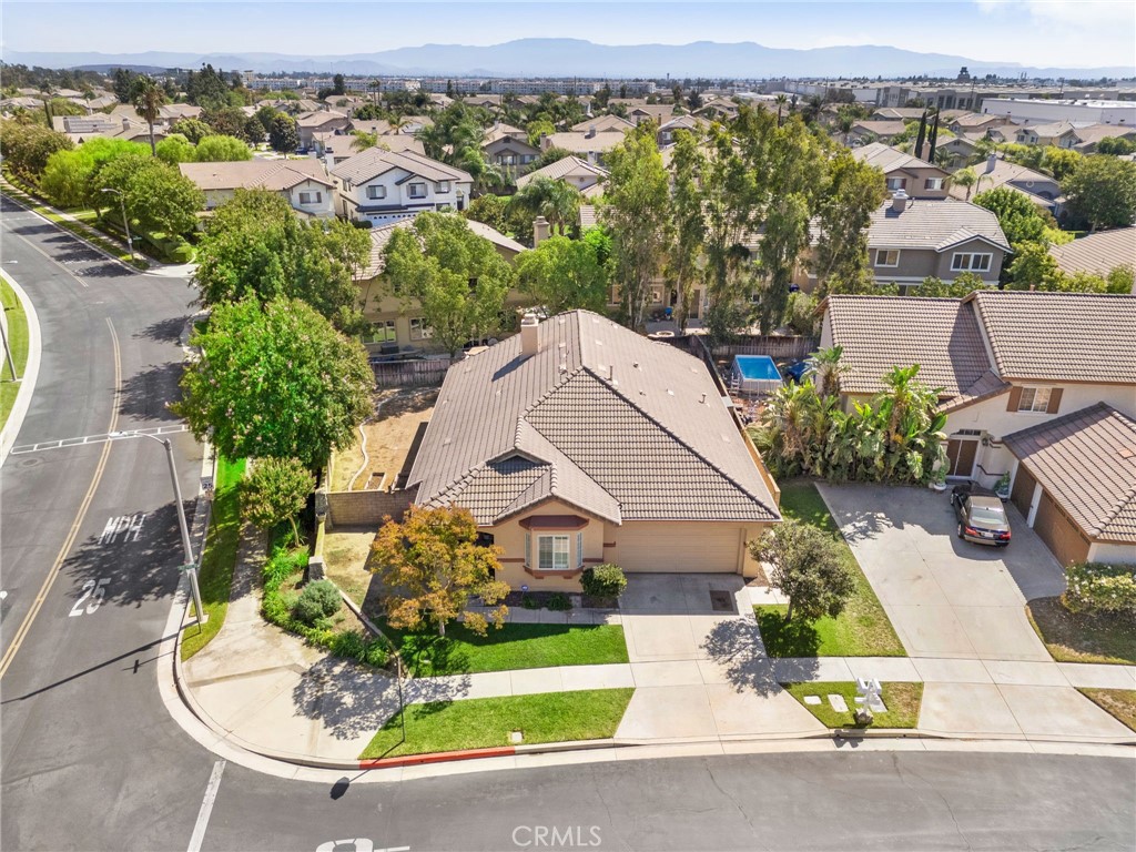 9403 Old Post Drive Rancho Cucamonga, CA 91730 - Photo 38 of 38 an aerial view of a house with a swimming pool outdoor seating and yard