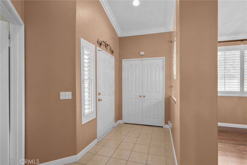 9403 Old Post Drive Rancho Cucamonga, CA 91730 - Photo 5 of 38 a view of an empty room and window