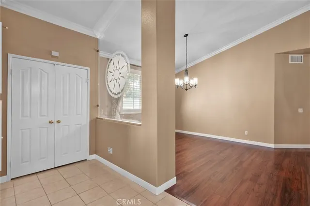 a view of room with wooden floor